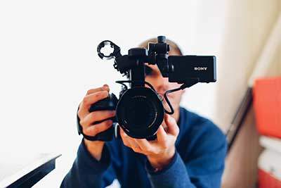 man making a video